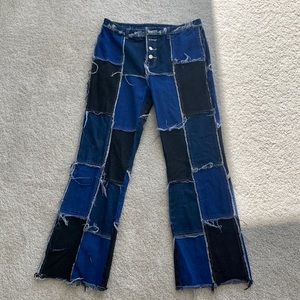 Patched jeans. Women’s size large.